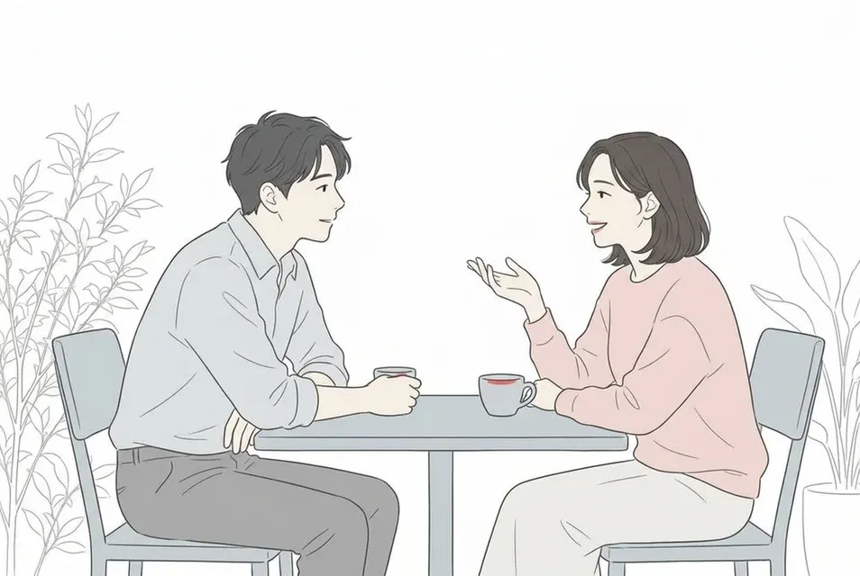 落ち着いたカフェの席で、見栄を張らずに穏やかな表情で女性の話に耳を傾ける男性